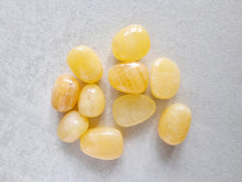 Load image into Gallery viewer, Orange Calcite tumble stone
