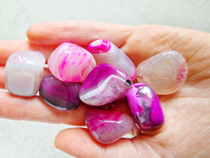 Pink banded agate tumble stone