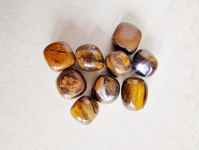 Gold tigers eye tumble stone