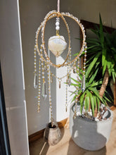 Load image into Gallery viewer, Crystal suncatcher with snow aura - Aoife