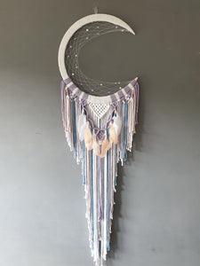 Aurora mooncatcher with feathers