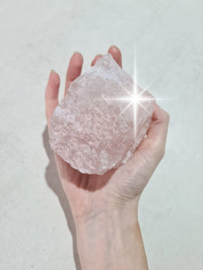 Large rose quartz stone. Big natural rose quartz crystal