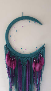 Peacock coloured moon catcher with pretty feathers