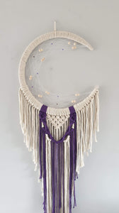 Pretty mooncatcher with purple string