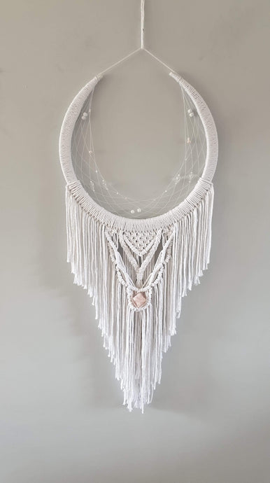 Pure white dream catcher with crystal.